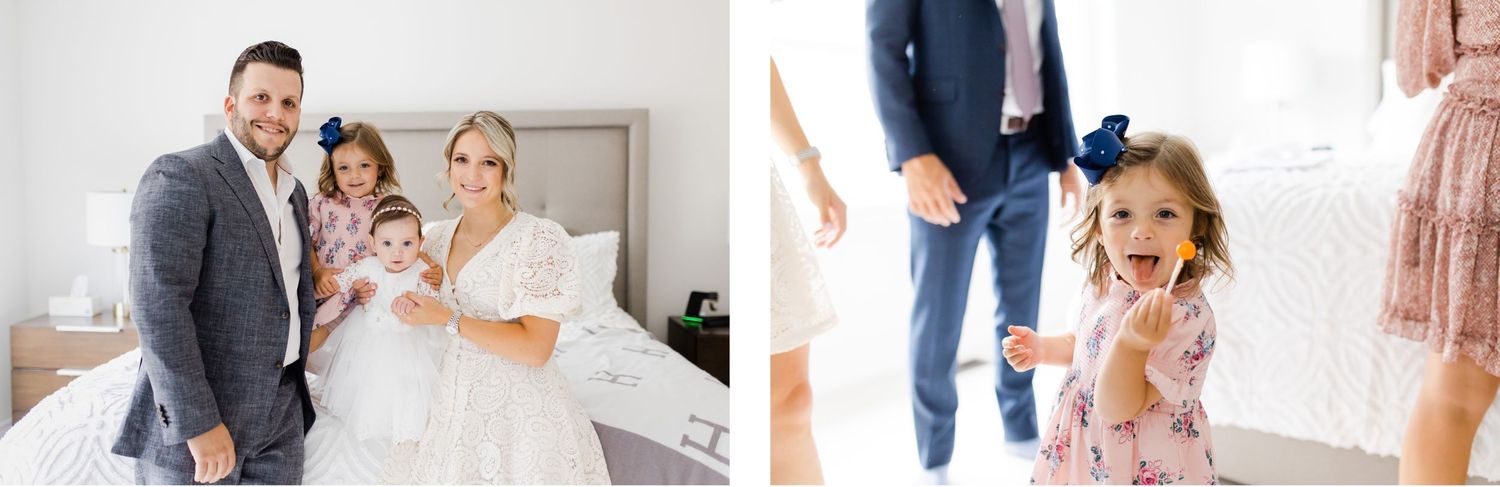 Family celebrating a special moment in a bright bedroom with formal attire.