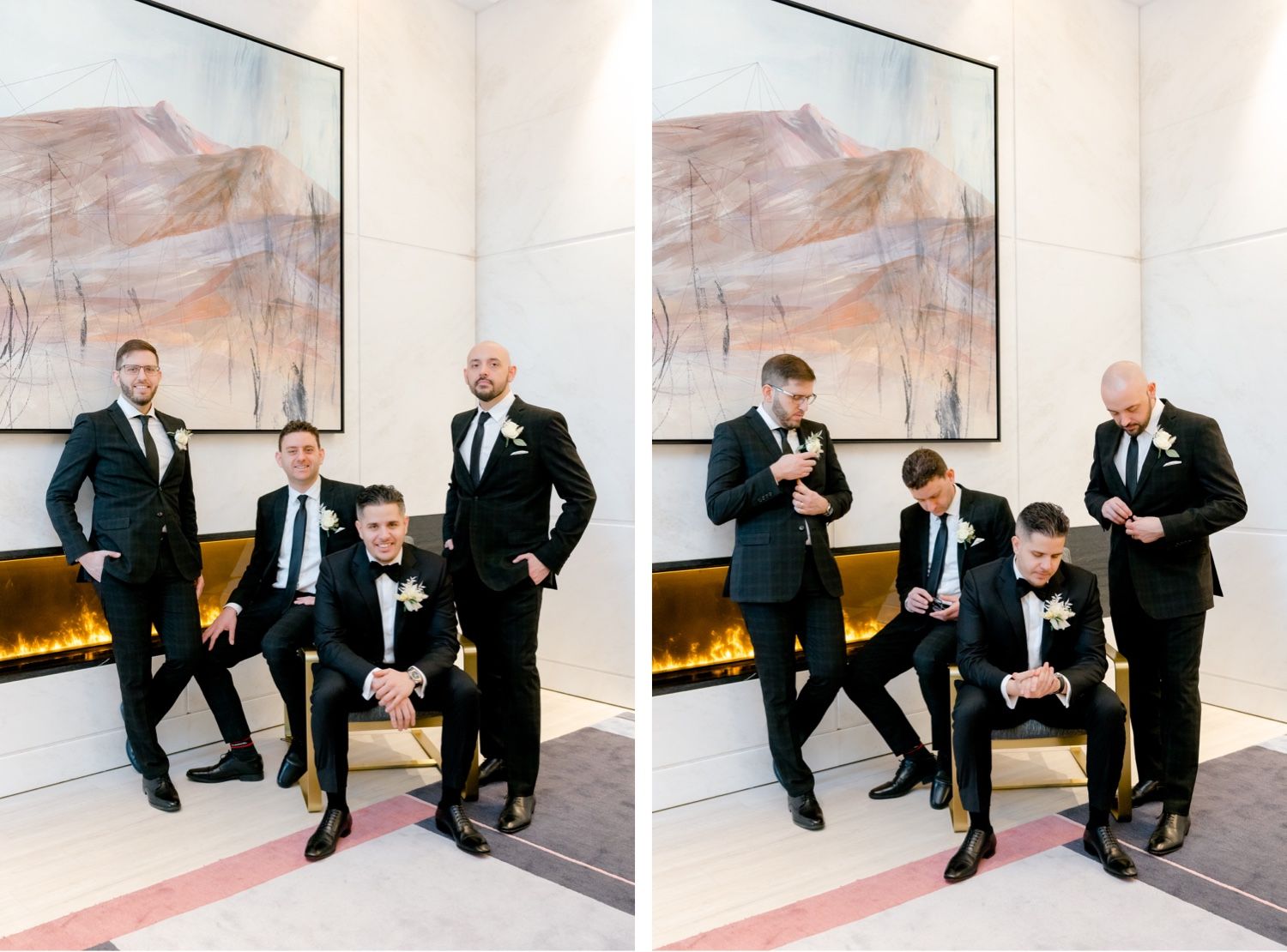 Wedding party of groomsmen in black tuxedos pose playfully in modern venue setting.