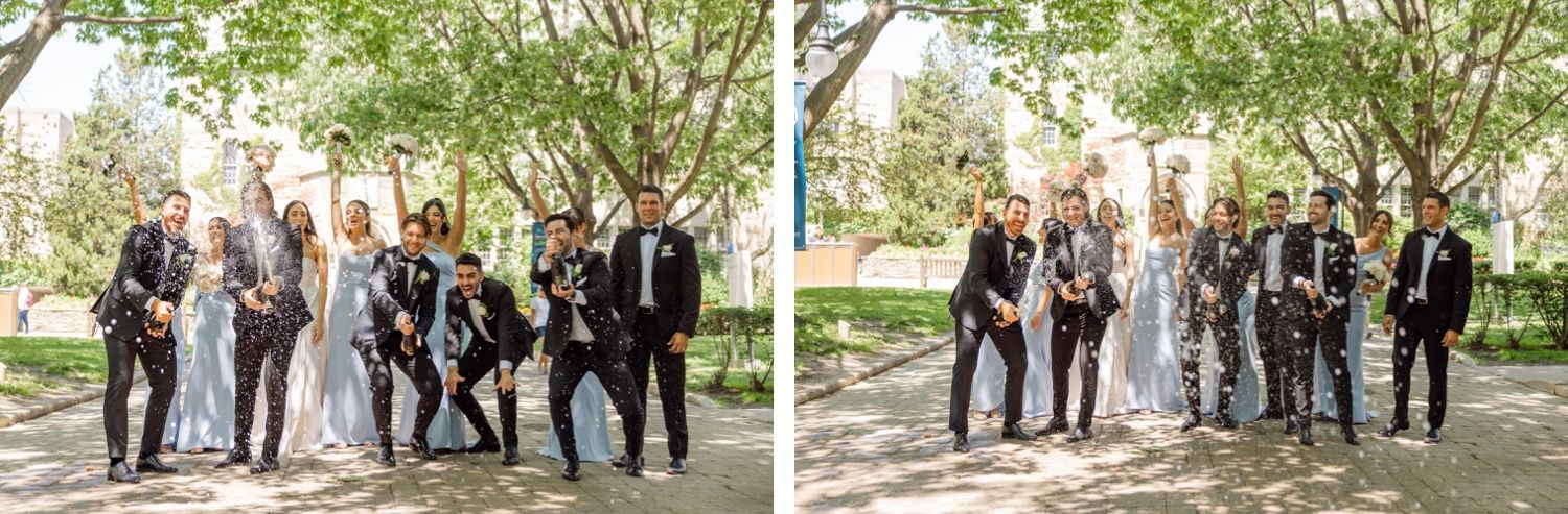 Wedding party gathers for fun group photos outdoors under leafy trees.