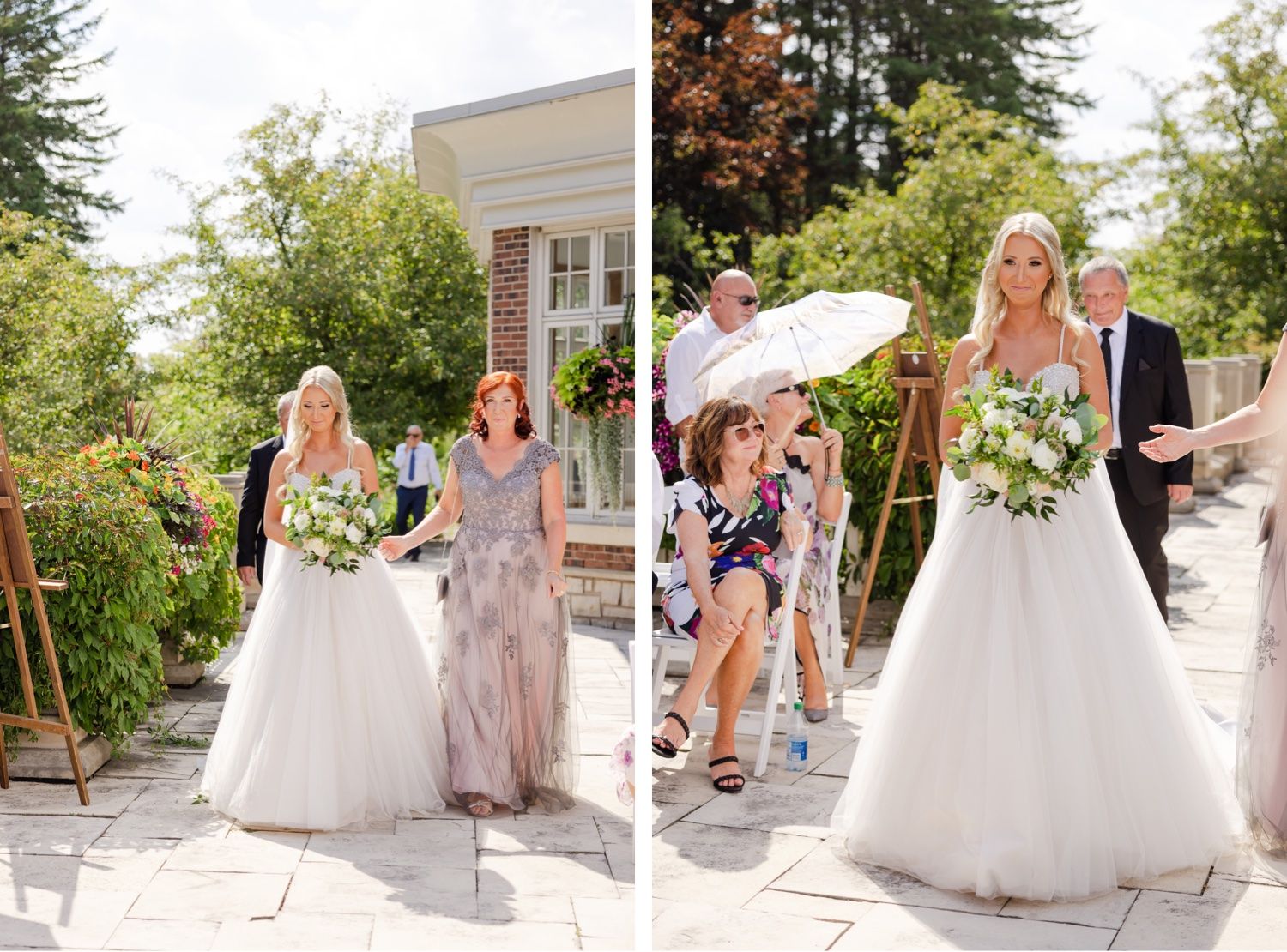 Wedding party members walk along a stone pathway with umbrellas during an outdoor ceremony.