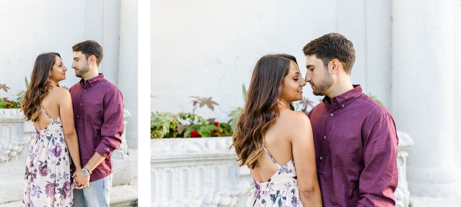 Intimate couple portraits against white architecture in complementary purple outfits.