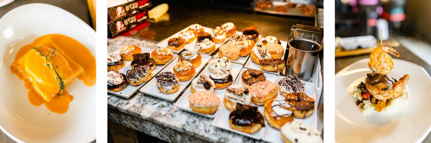 Artfully plated desserts and appetizers displayed at an upscale catering event.