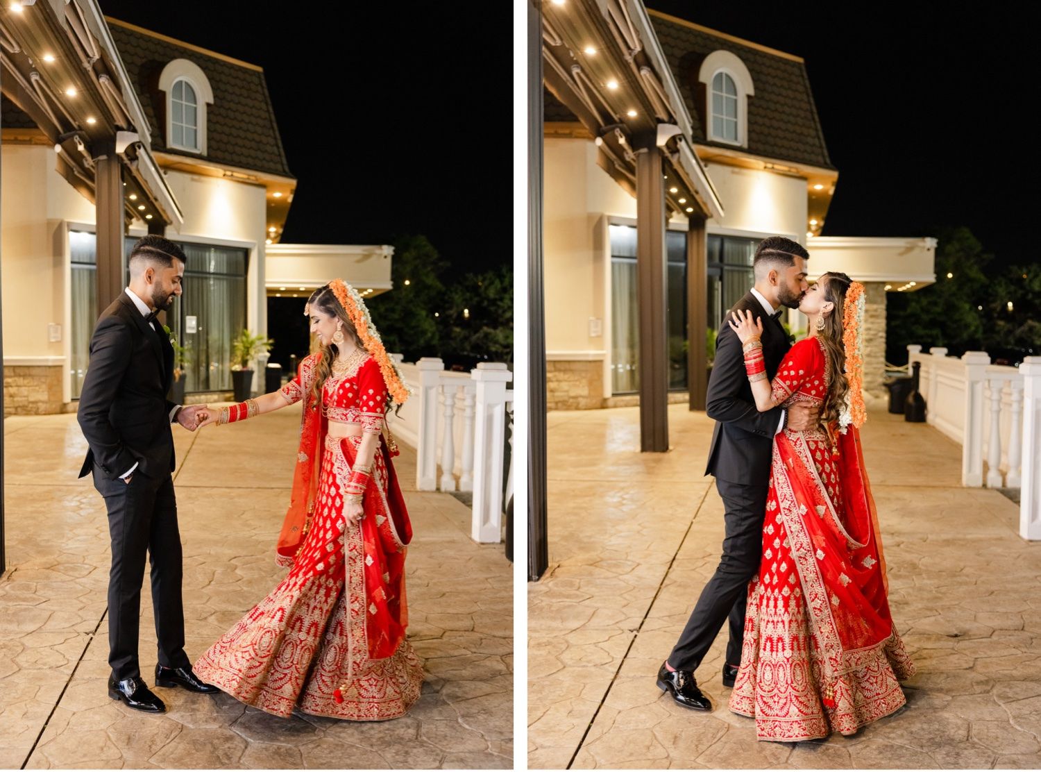 A couple shares a romantic moment in formal attire, with the person in a stunning red lehenga outside a lit building.