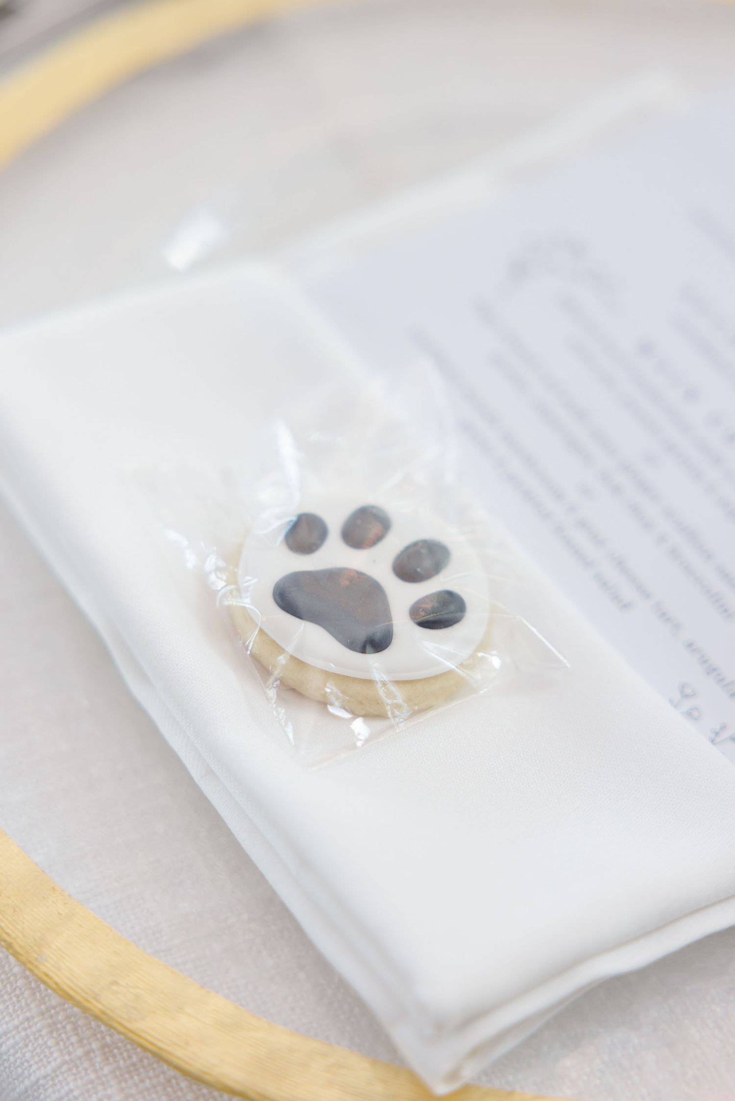 Close-up of wedding program details printed on white paper.