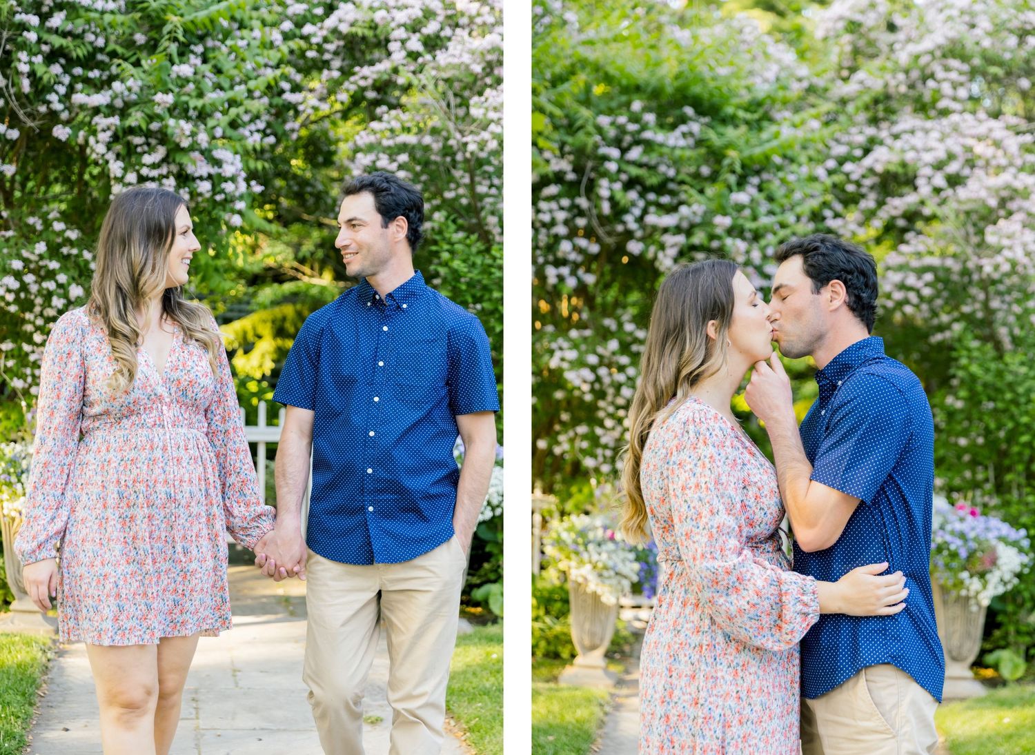 A romantic couple shares intimate moments on a garden path with beautiful white blossoms behind them.