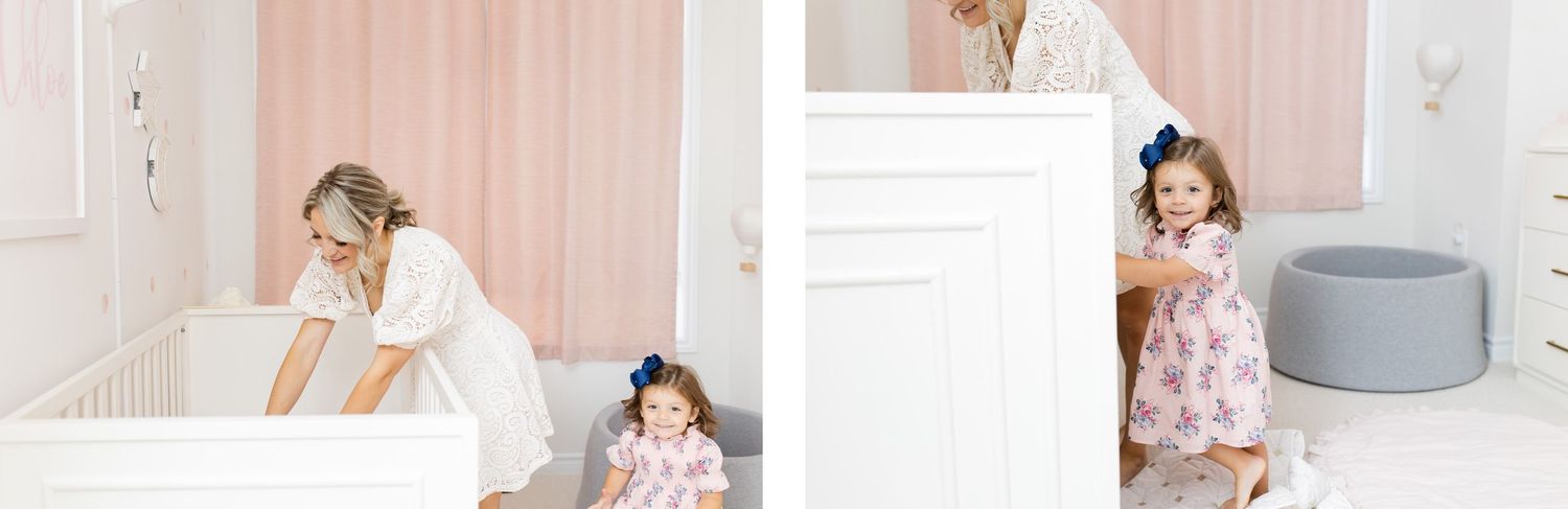 Soft pink nursery interior with white furniture and decor elements.