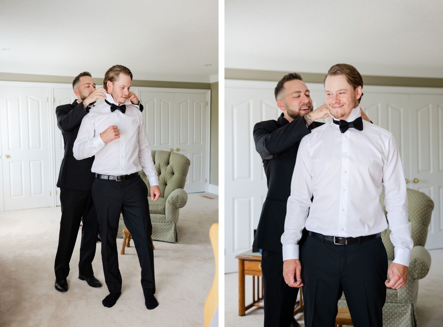 Two people in formal attire laughing and adjusting clothing during wedding preparations.