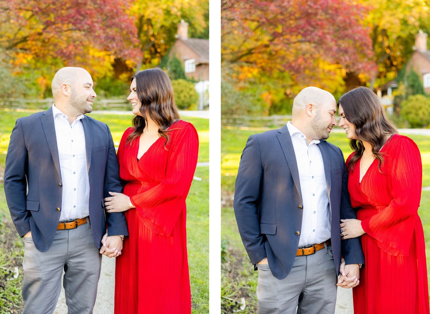 Two people share an intimate moment while standing on a path surrounded by autumn trees.