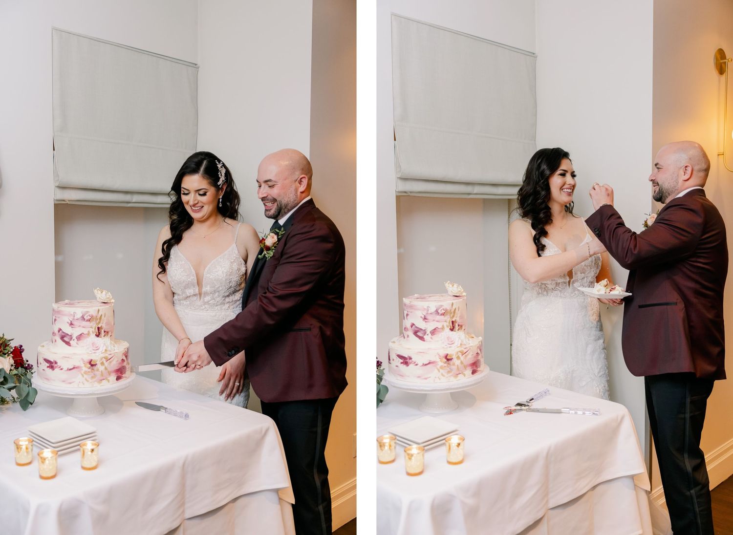 Two people stand at a wedding cake table during the cake cutting ceremony.