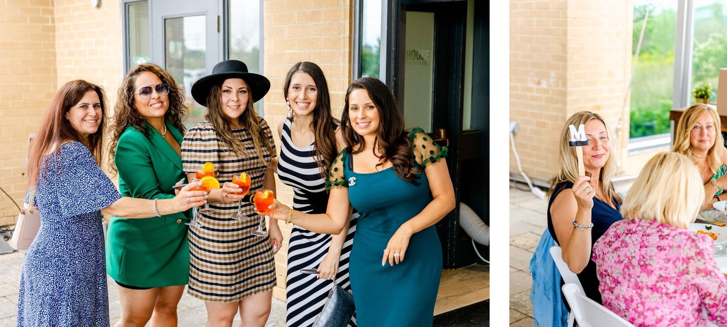 Group of friends in colorful dresses gathered for a celebratory drink outside.