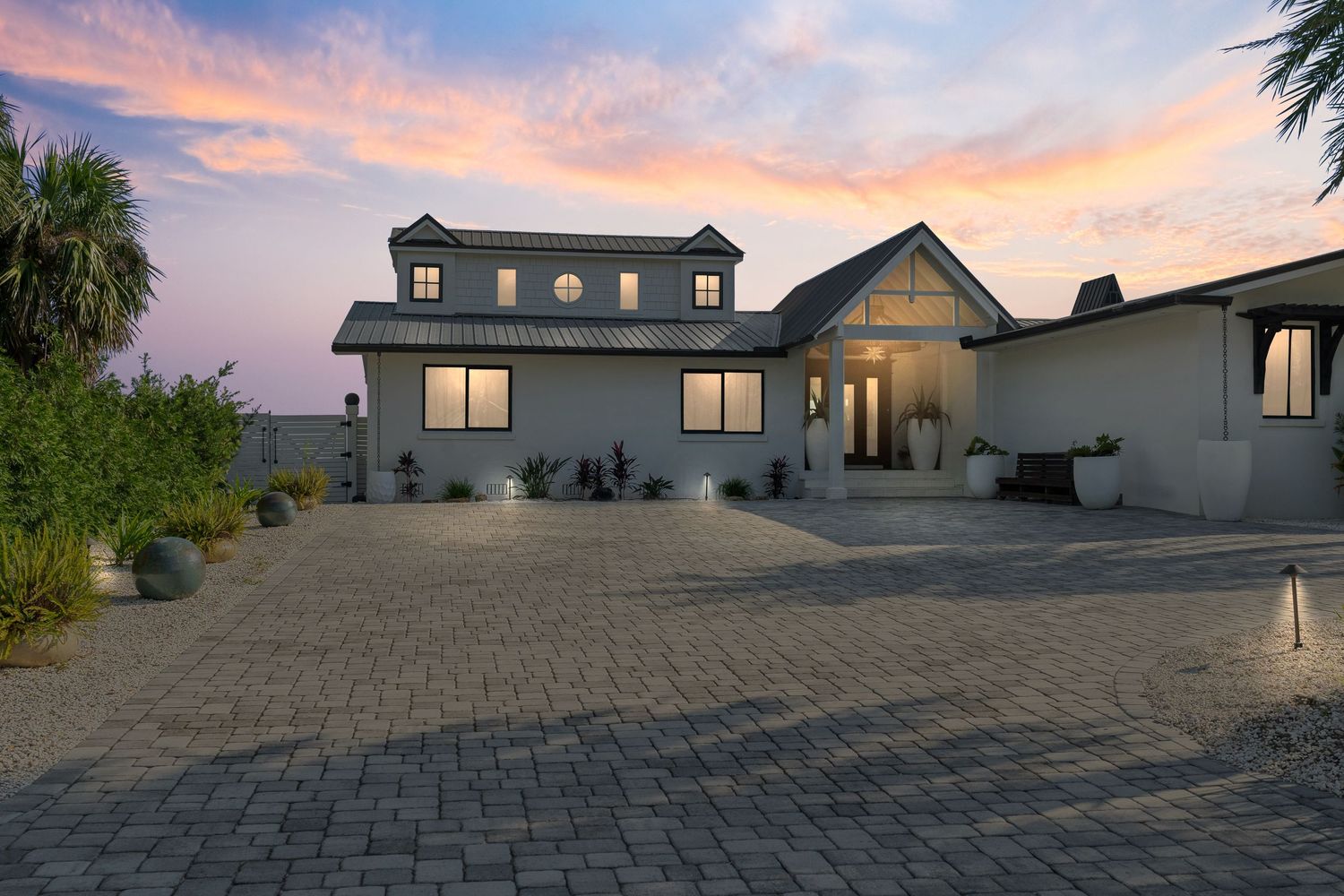 Twilight sky backdrops a gorgeous home.