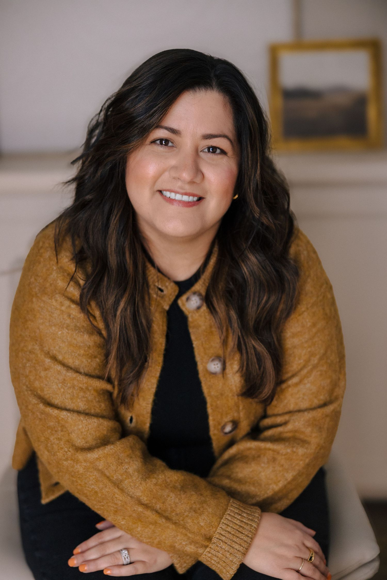Portrait series showing someone in a mustard sweater against a neutral background.