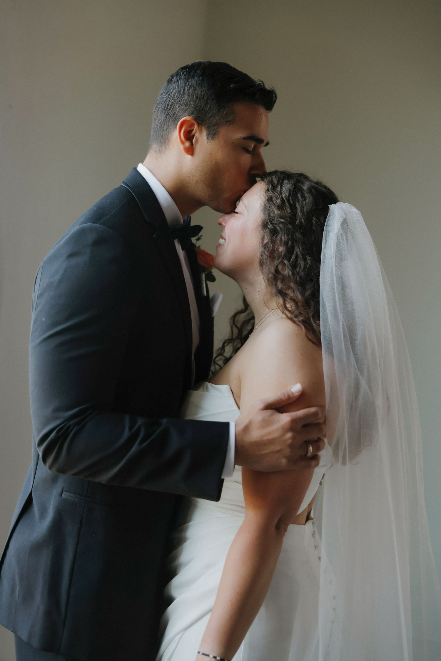 Intimate wedding portrait sequence showing tender moments between newlyweds.