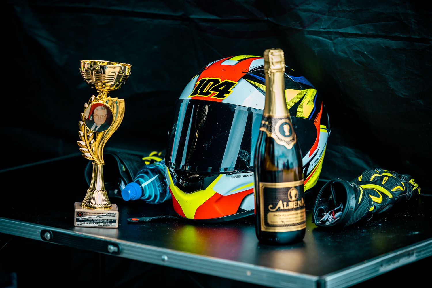 Trophy and racing helmet detail captured after competition, highlighting achievement and motorsport identity in Bulgaria.