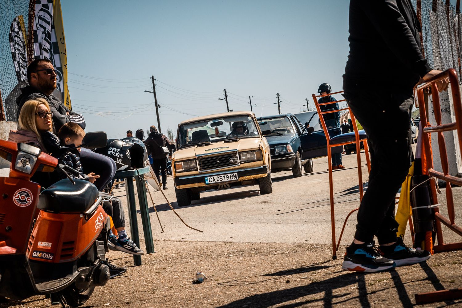 Behind-the-scenes moment at a car meet in Bulgaria, showcasing participants, vehicles and the authentic community vibe of the event.