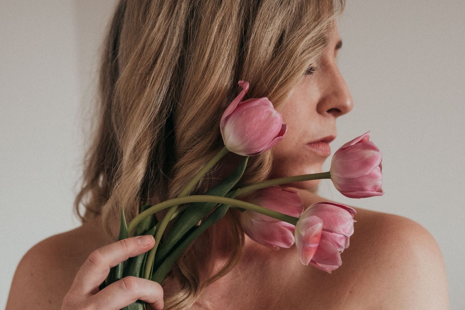 Self portrait flowers moody lighting
