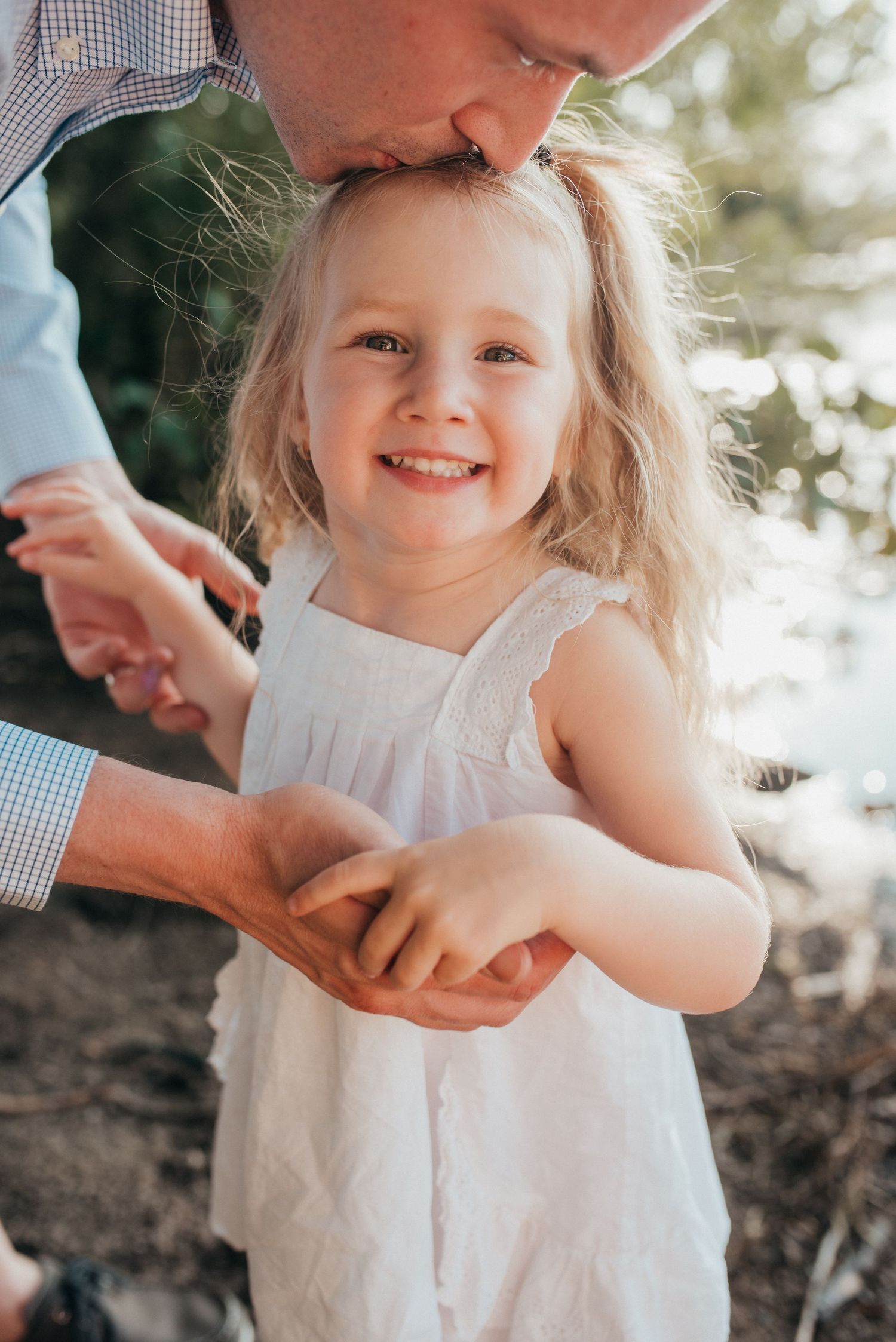 Family session outdoor portrait golden hour