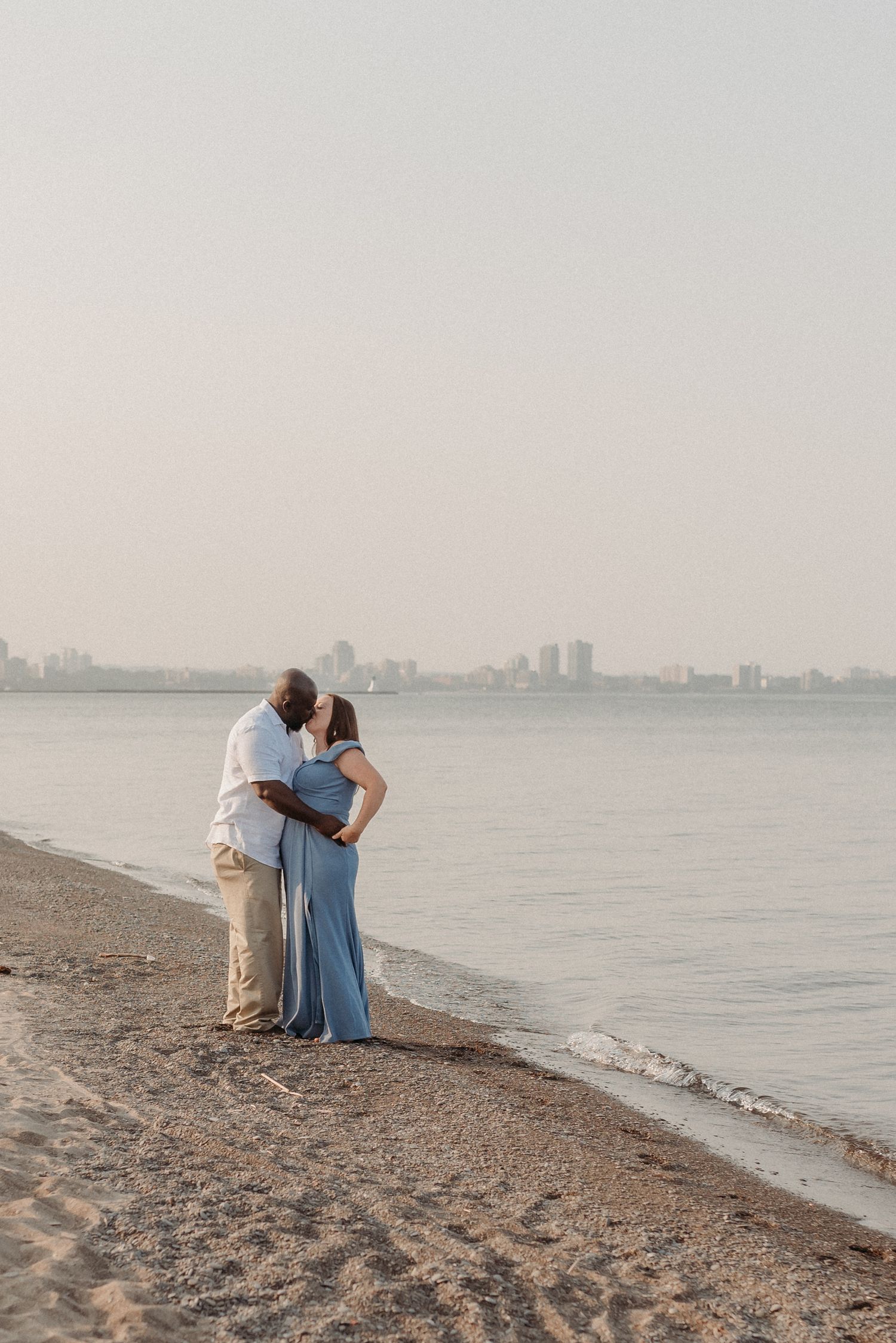 Family session portrait on the beach golden hour