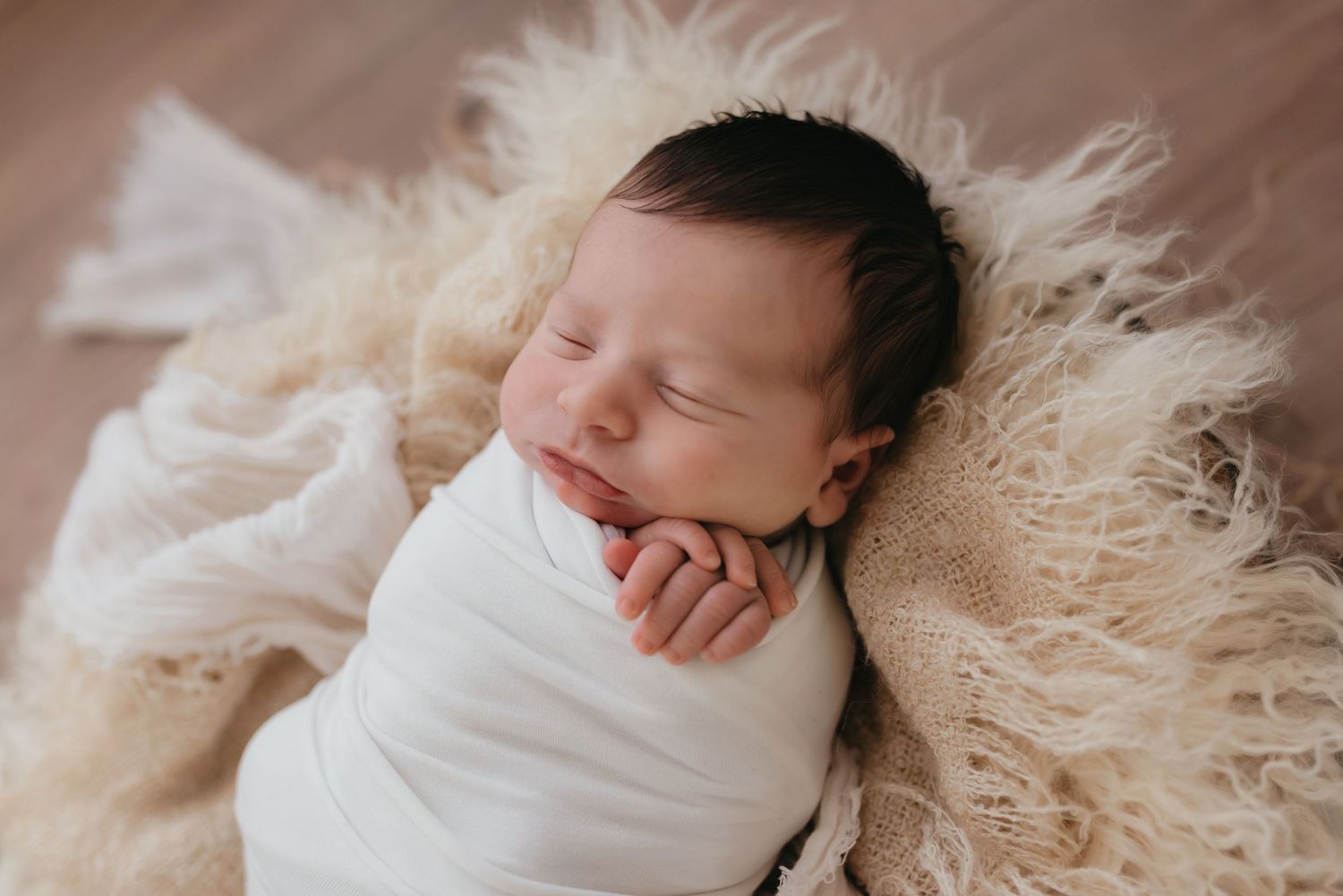 Posed newborn session natural in studio