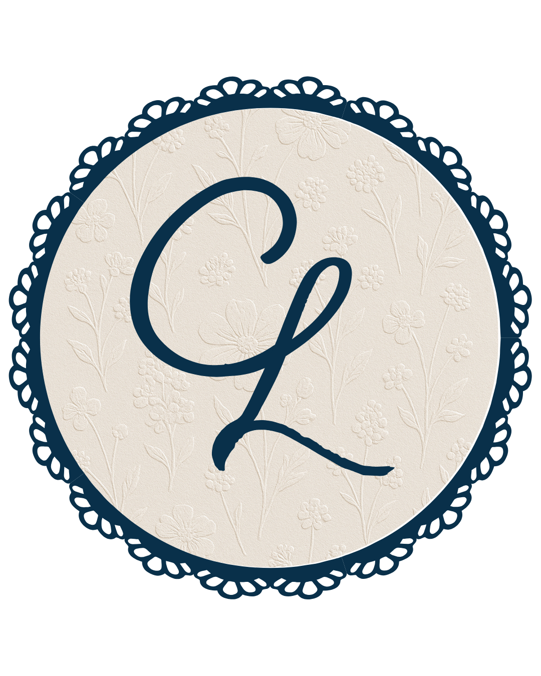 A decorative circular monogram with the letter L in navy blue with a lace-like border.