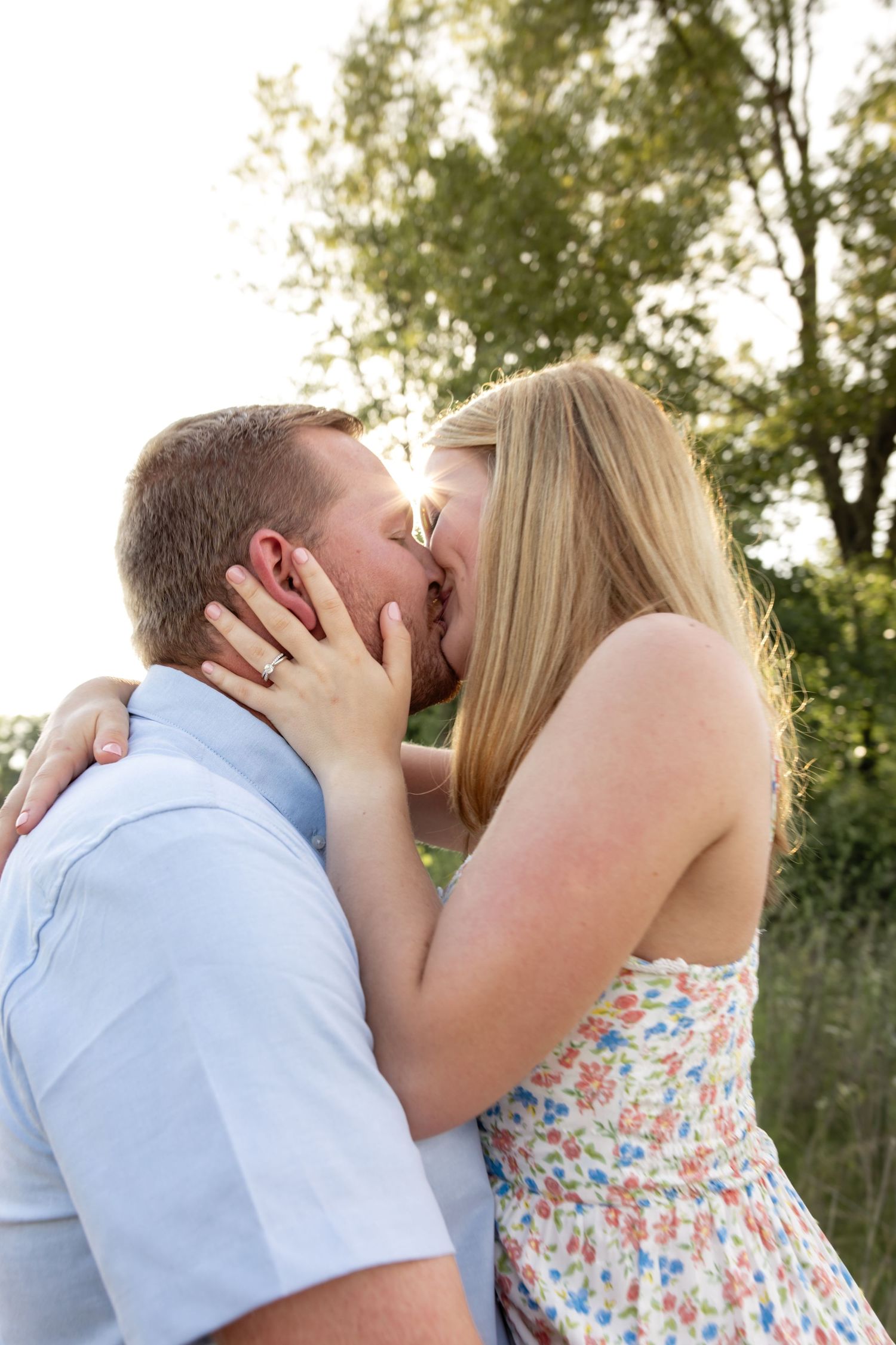 Intimate couple portraits captured during golden hour in nature.