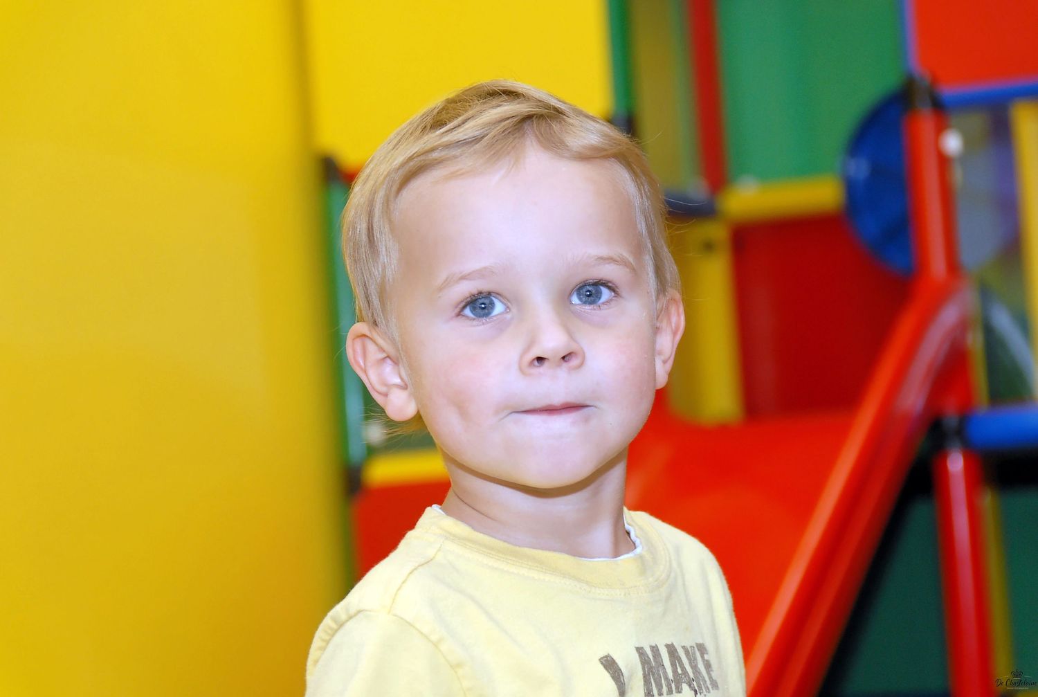 Child portrait boy by slide