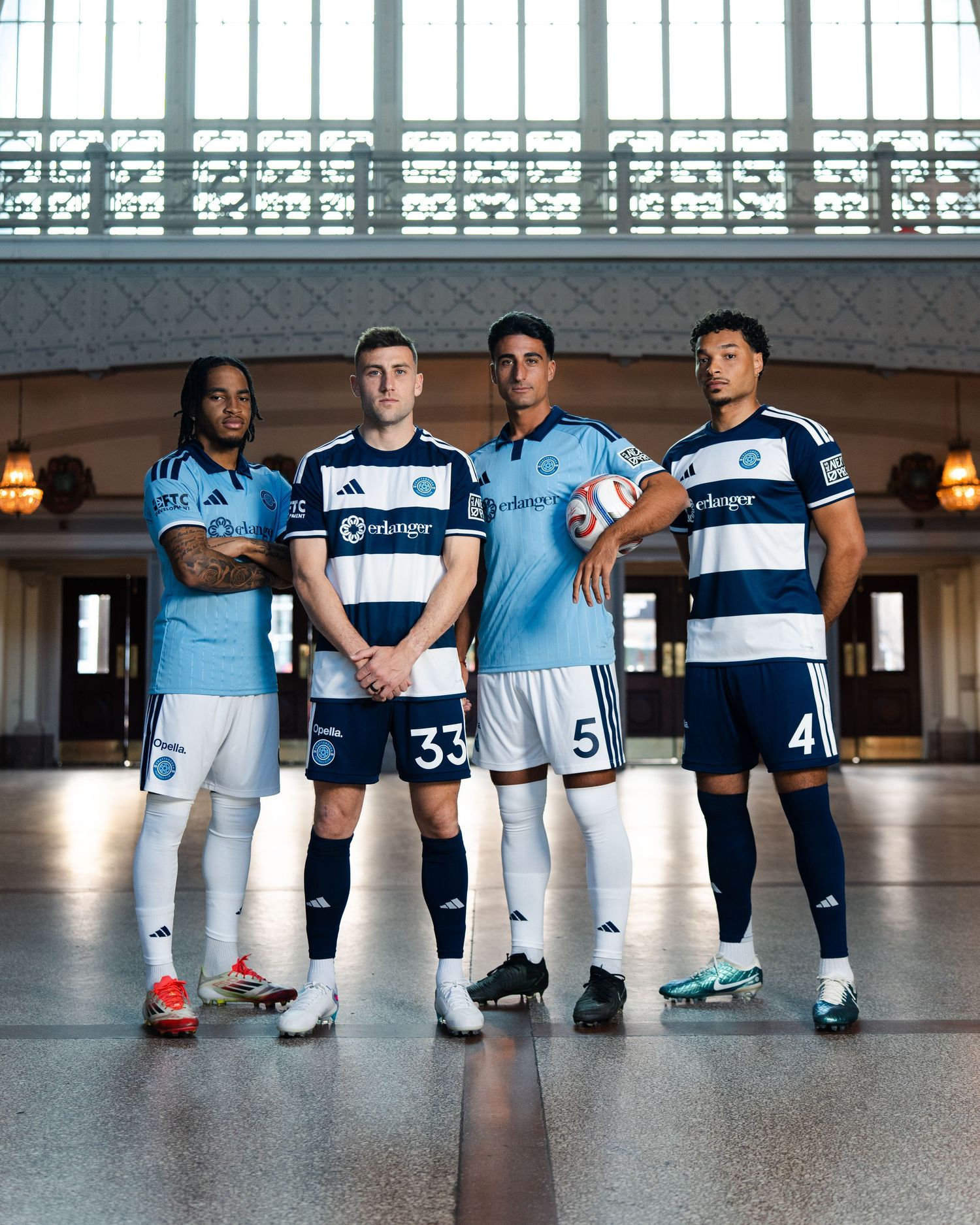 Four Chattanooga FC soccer players pose in home and away kits photographed for a creative sports assignment in Chattanooga, TN.