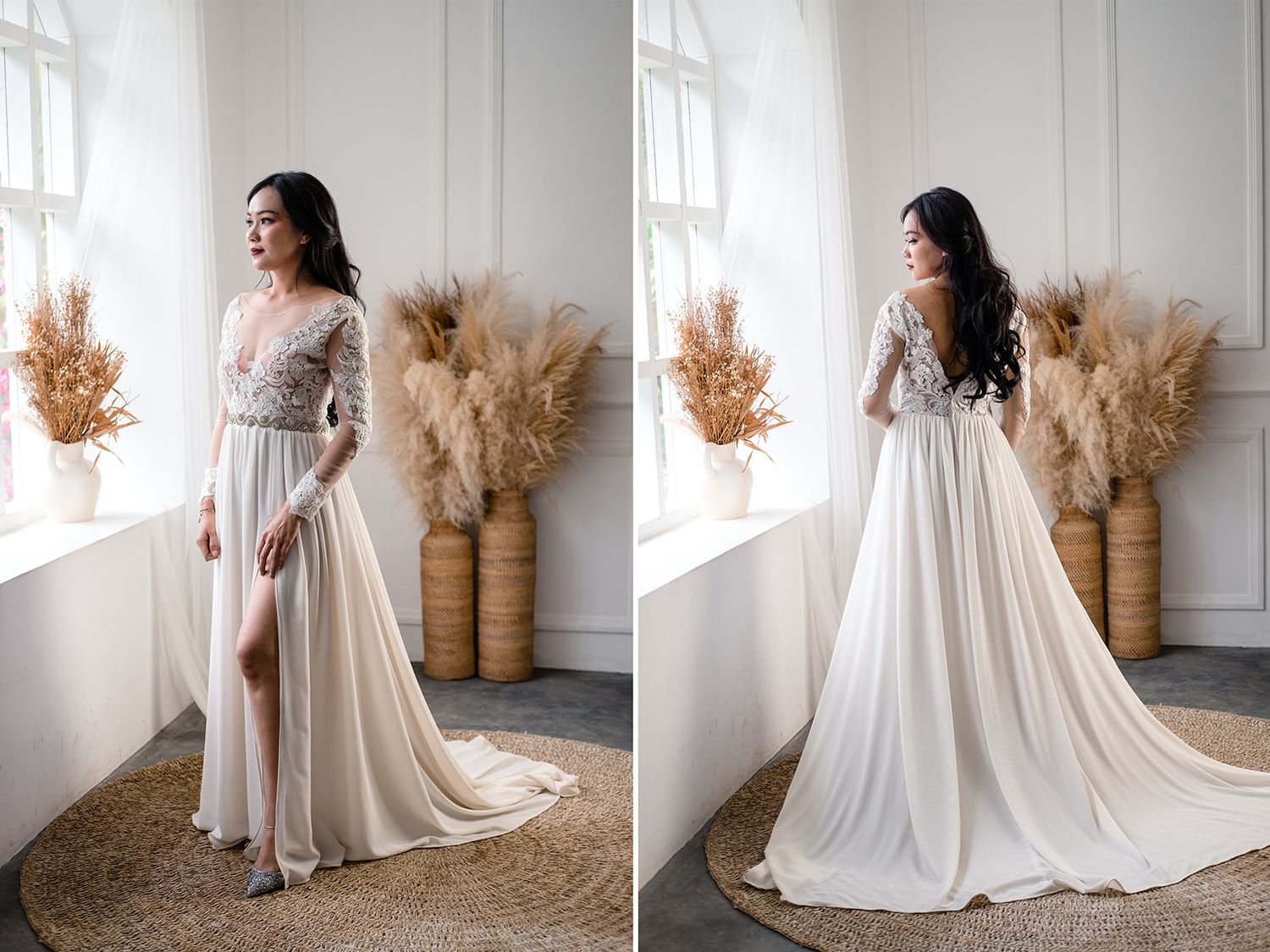 Elegant bride in a lace long-sleeve wedding gown with a high slit, posing near a window with pampas grass decor.
