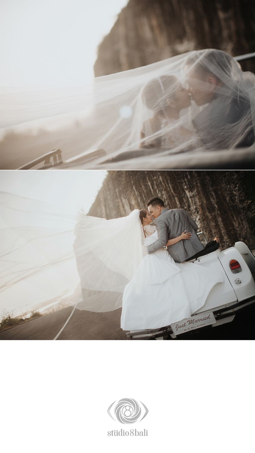 Bride and groom sharing a romantic kiss under a flowing veil beside a Just Married car at sunset.