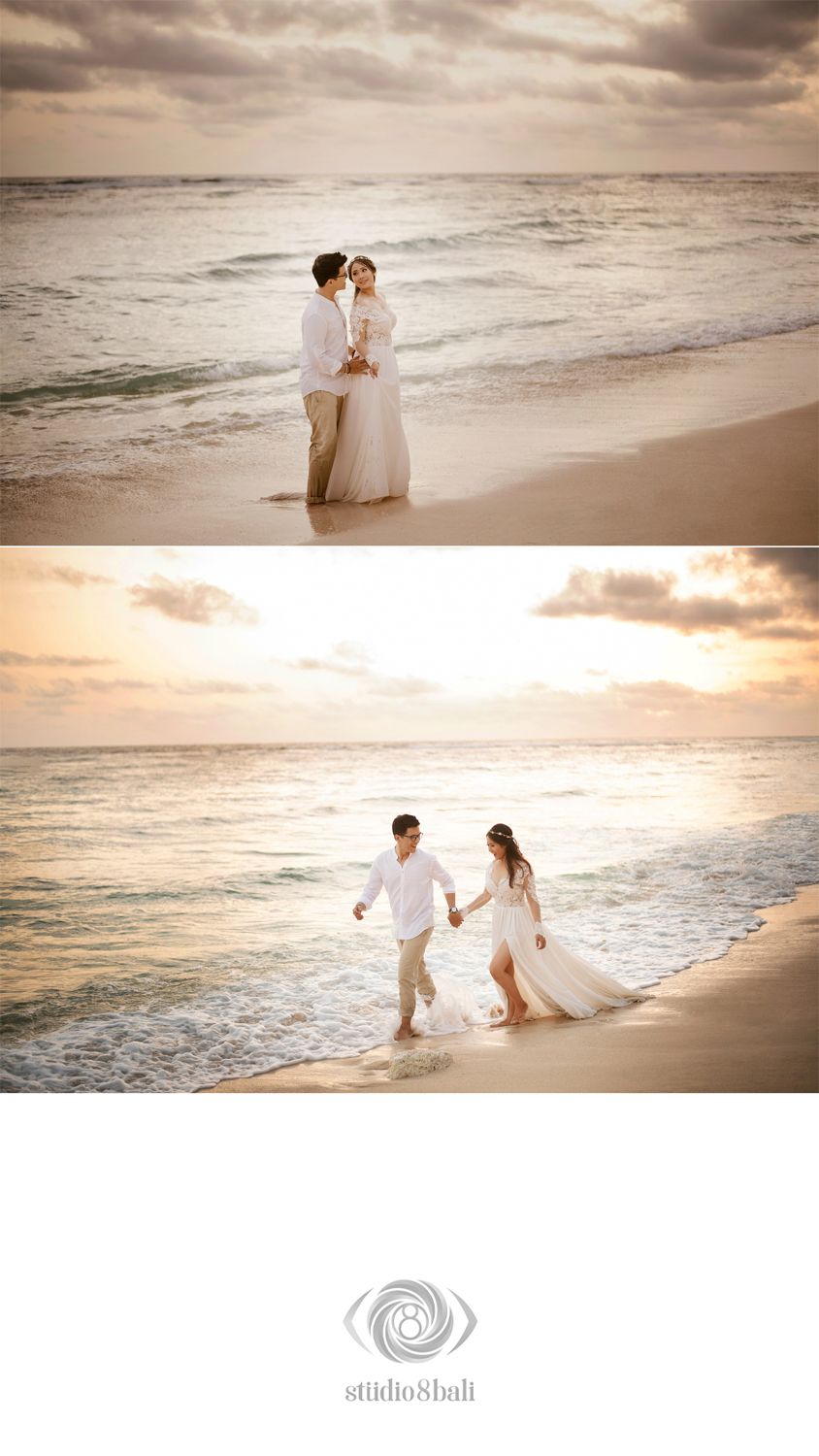 Romantic couple in white attire embracing and walking along a sandy beach at sunset with gentle ocean waves.