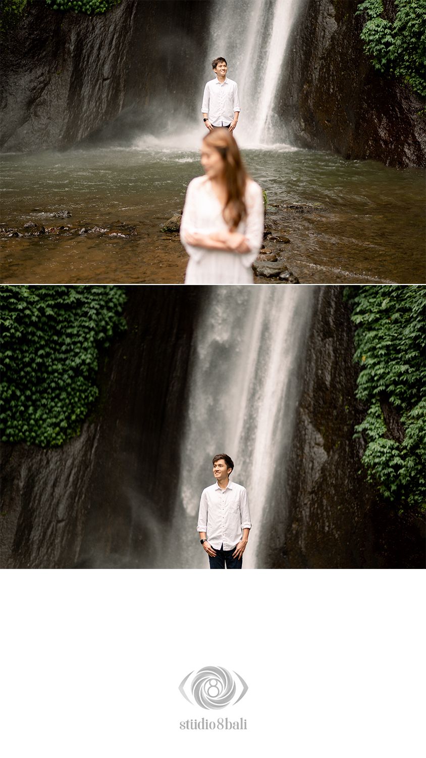 Couple poses romantically in front of a lush tropical waterfall, man in white shirt and woman in white dress on rocks.