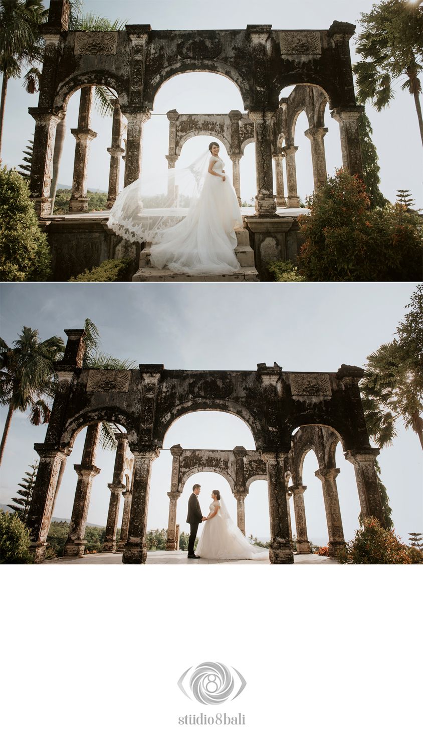Bride in flowing gown poses at ancient stone archway ruins in Bali, with groom in a romantic outdoor wedding photo.