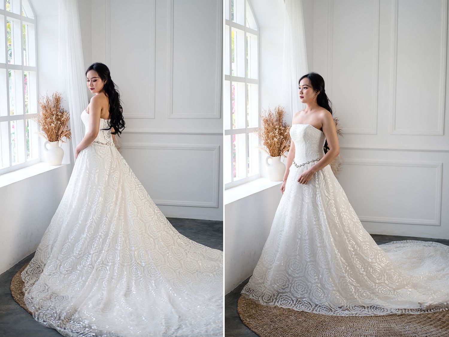 Bride in a strapless white ball gown wedding dress with intricate lace detailing and a cathedral train.