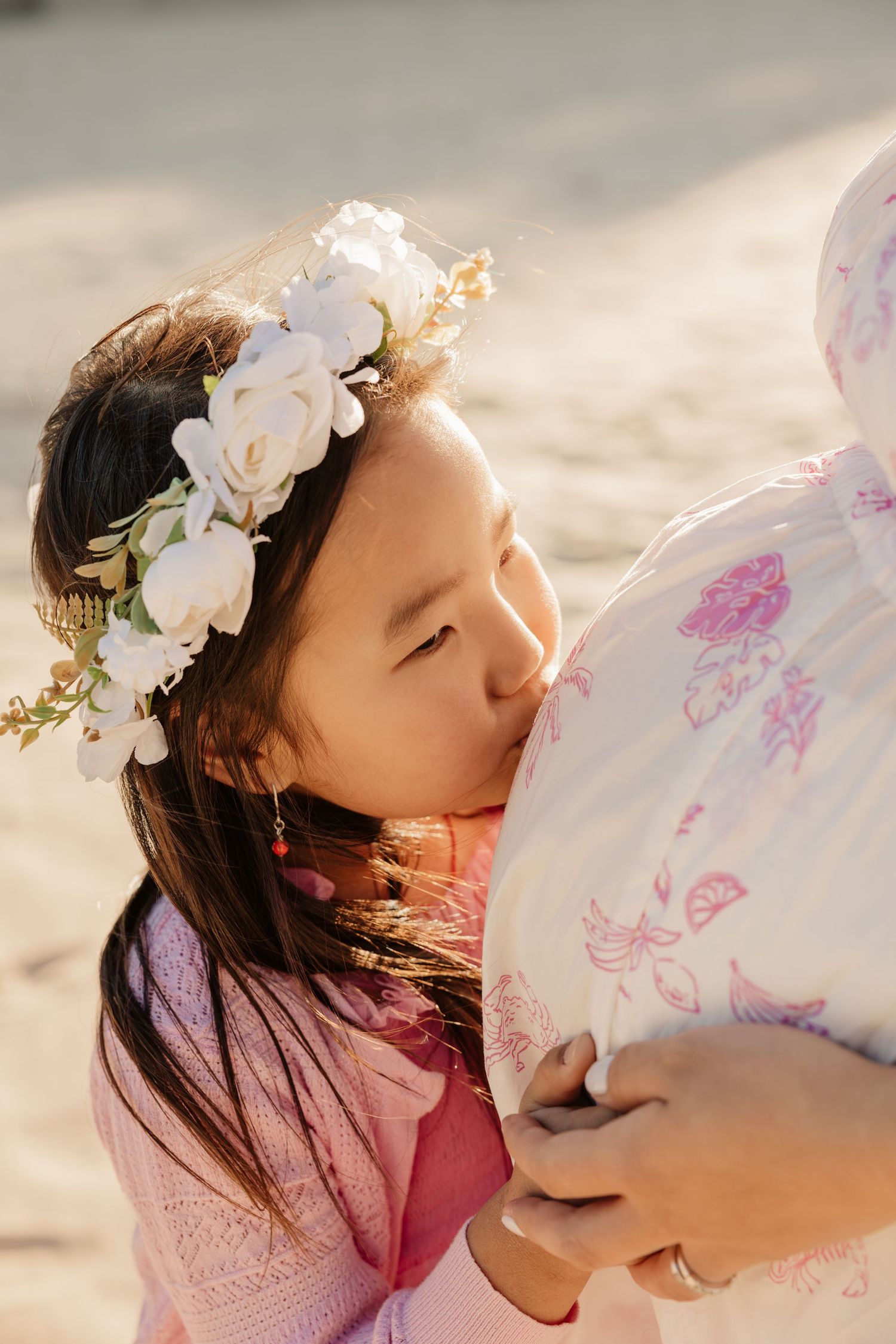 Child portrait at beach with floral headband, Sydney family photography