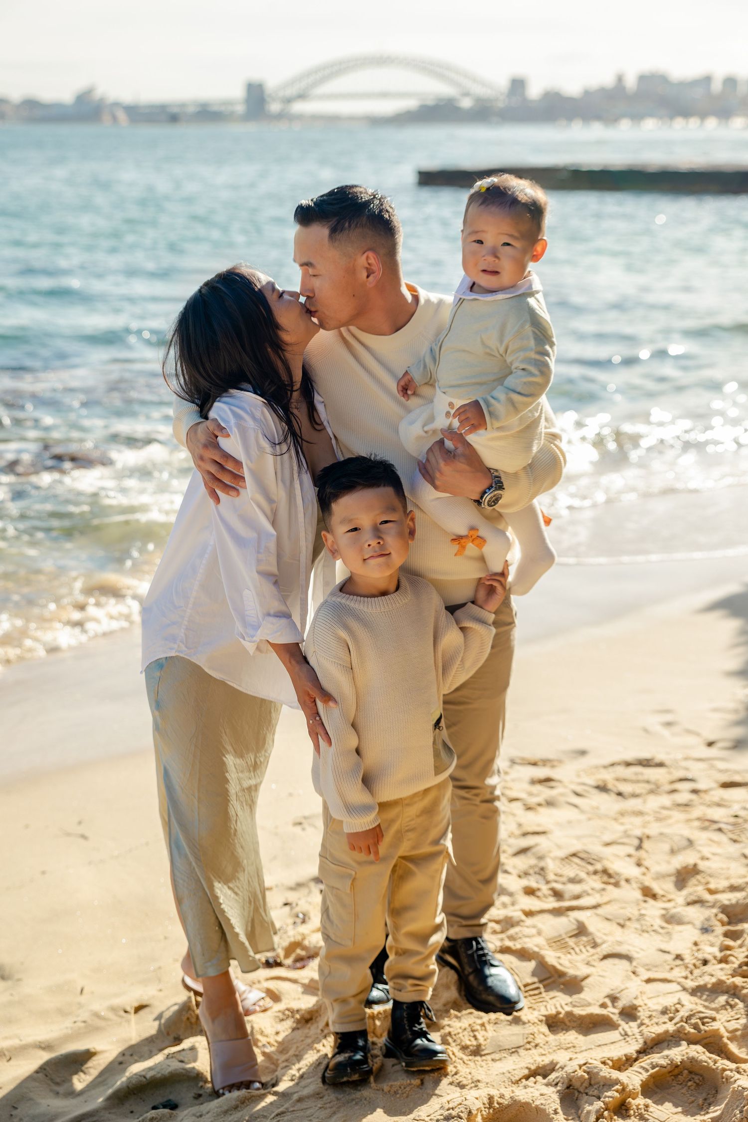 Family portrait at beach in golden light, Sydney family photography
