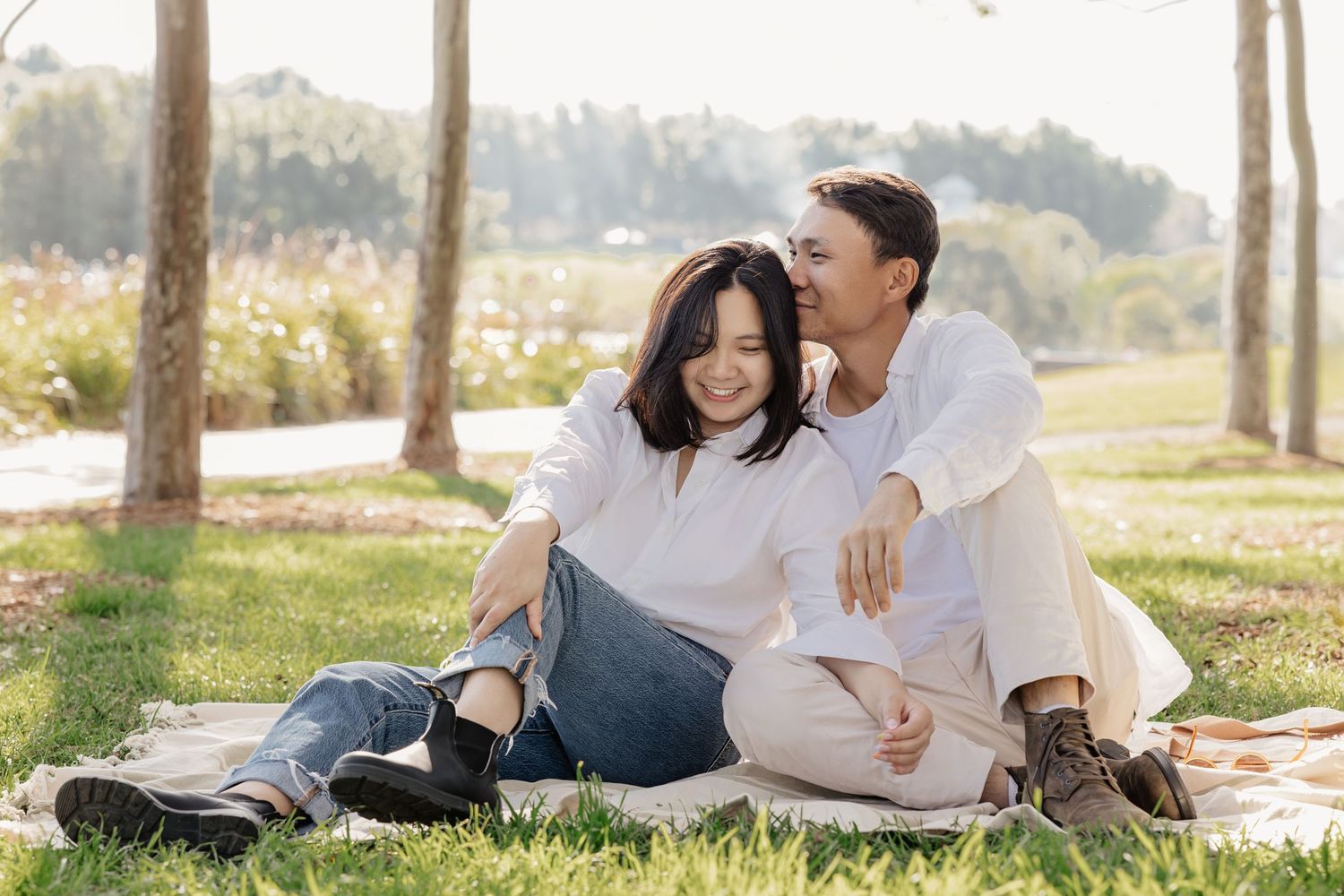 Outdoor couple maternity portrait sitting together in natural light, Sydney maternity photography