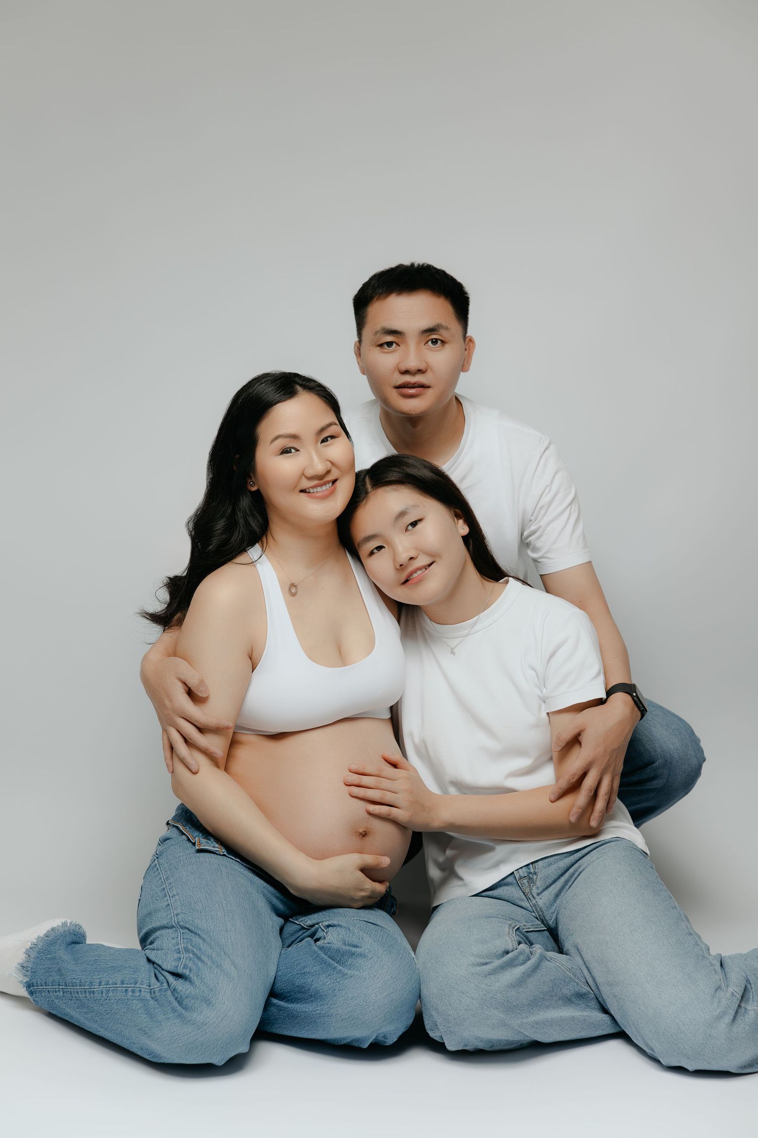Studio family maternity portrait with parents and child, Sydney family photographer