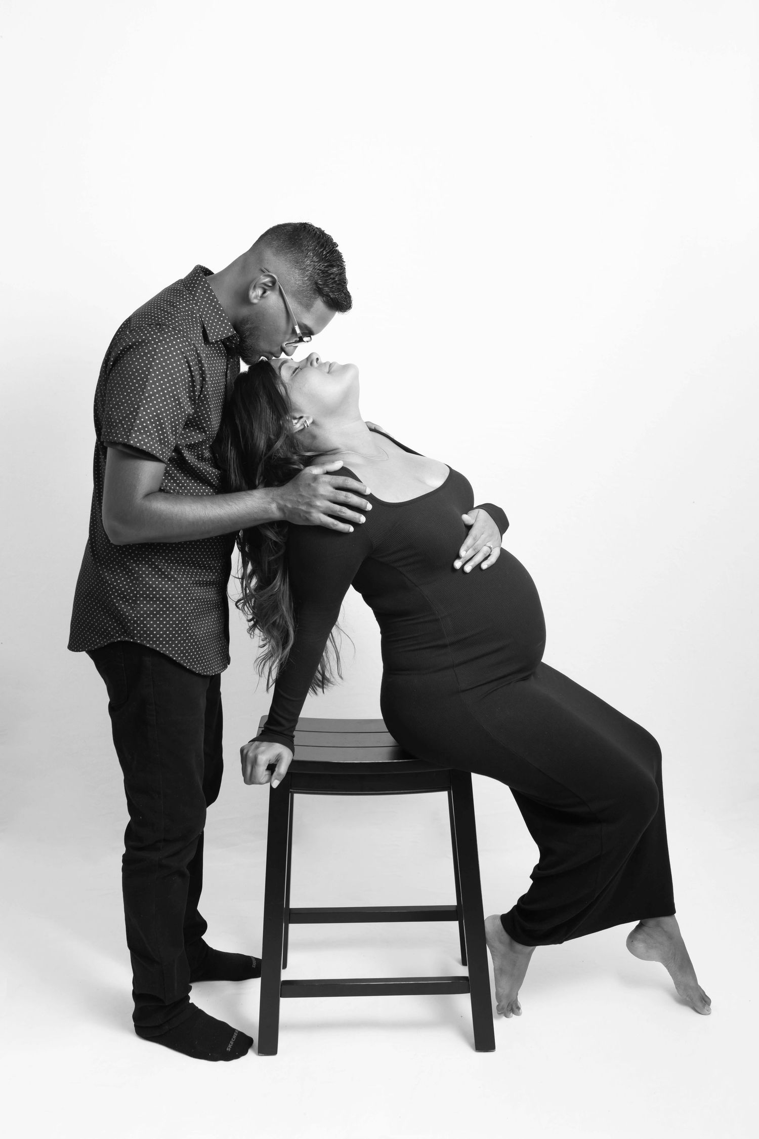 Simple, minimalist black and white couple maternity photo