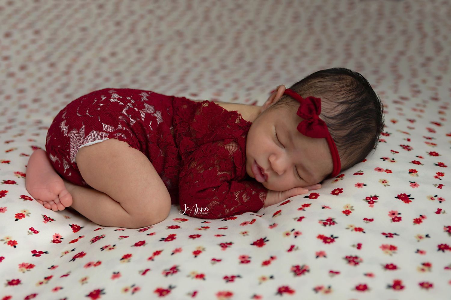 Newborn baby sleeping peacefully.