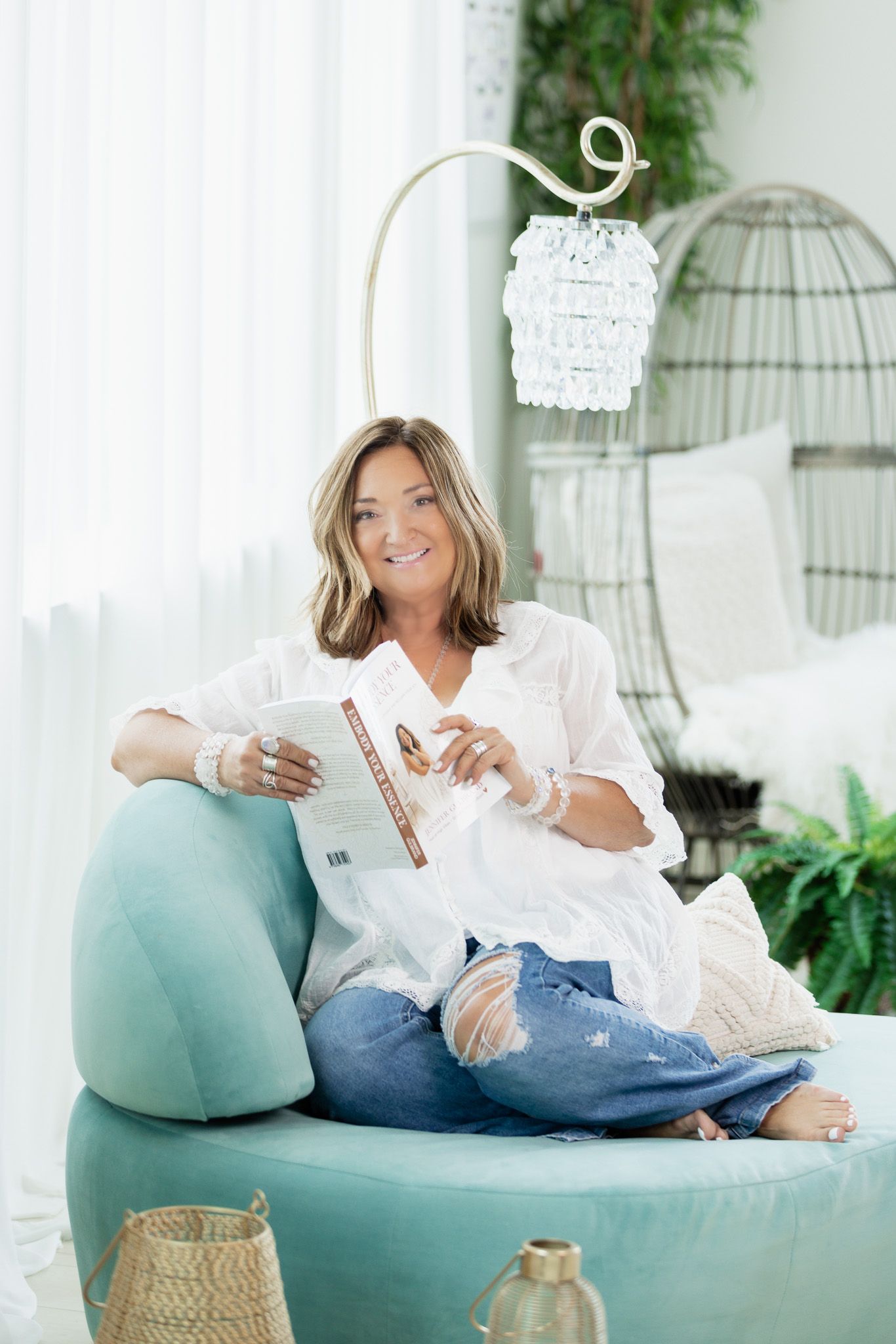 Casual lifestyle photos showing someone relaxing on a teal couch with books and decor.