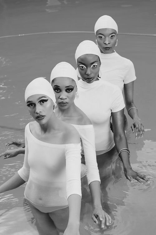 Black female swimmers synchronistic swimming