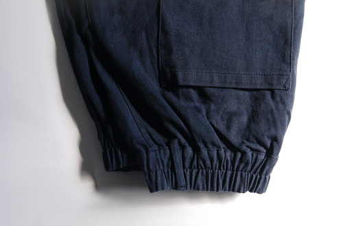 Blue cargo pants shot on white background