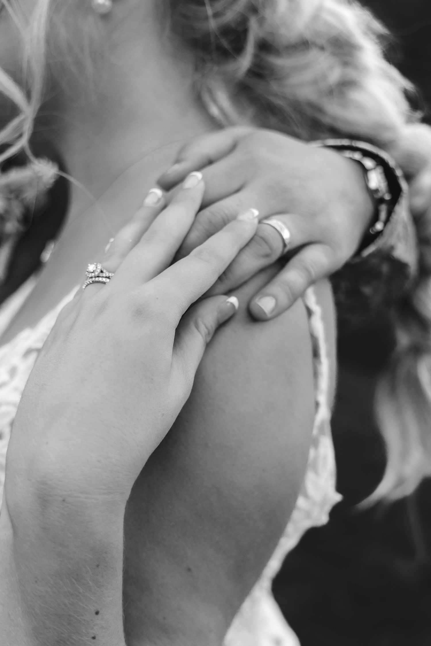 Black and white close-up series of hands with wedding rings showing tender moments.