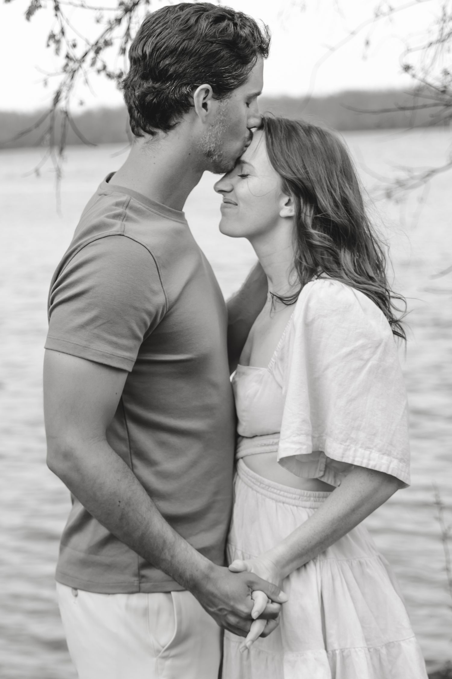 Romantic black and white portrait session by the water.