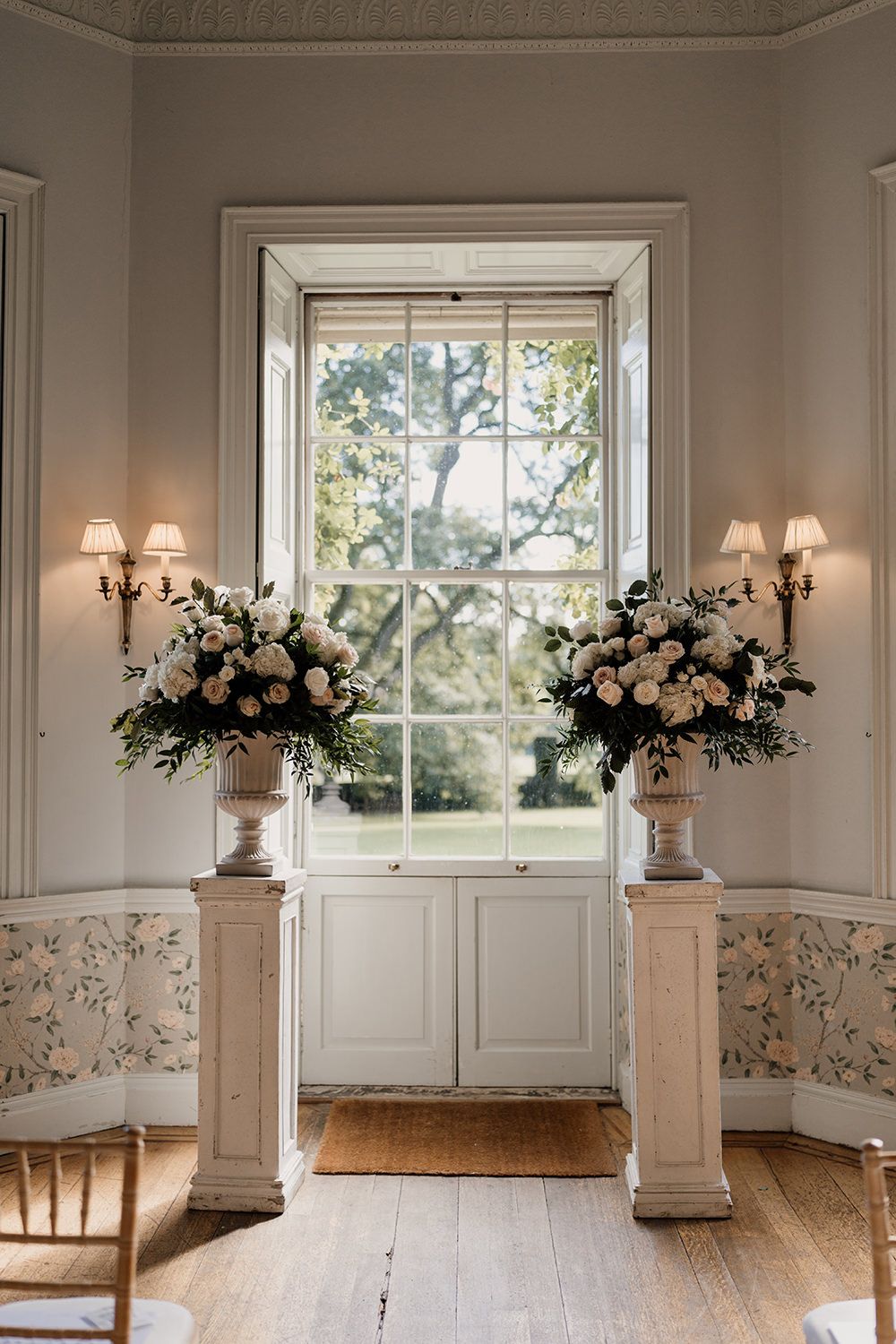 Intimate ceremony in the Main House at Middleton Lodge, with soft natural light and elegant floral styling.