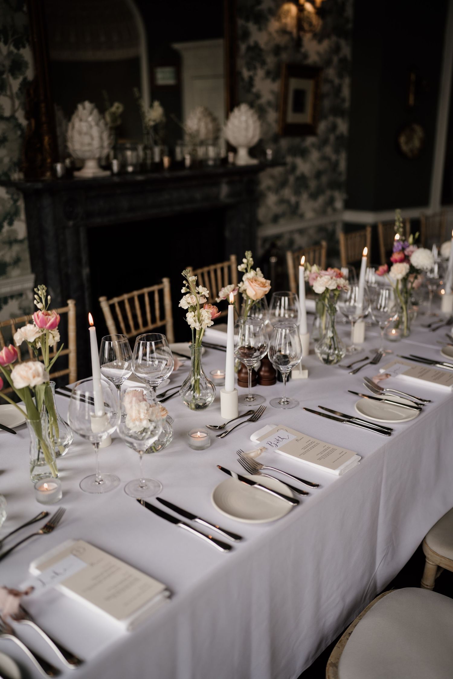 Wedding table styled and lit by candle light.
