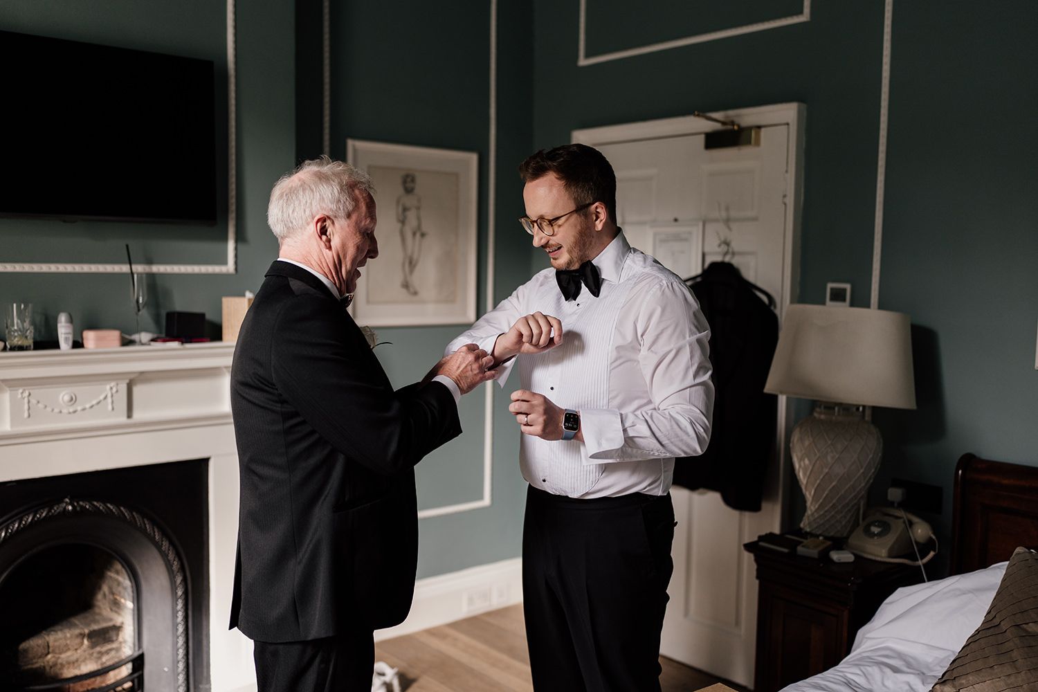 Groom and grooms dad getting ready at Middleton Lodge Estate the morning of their wedding.