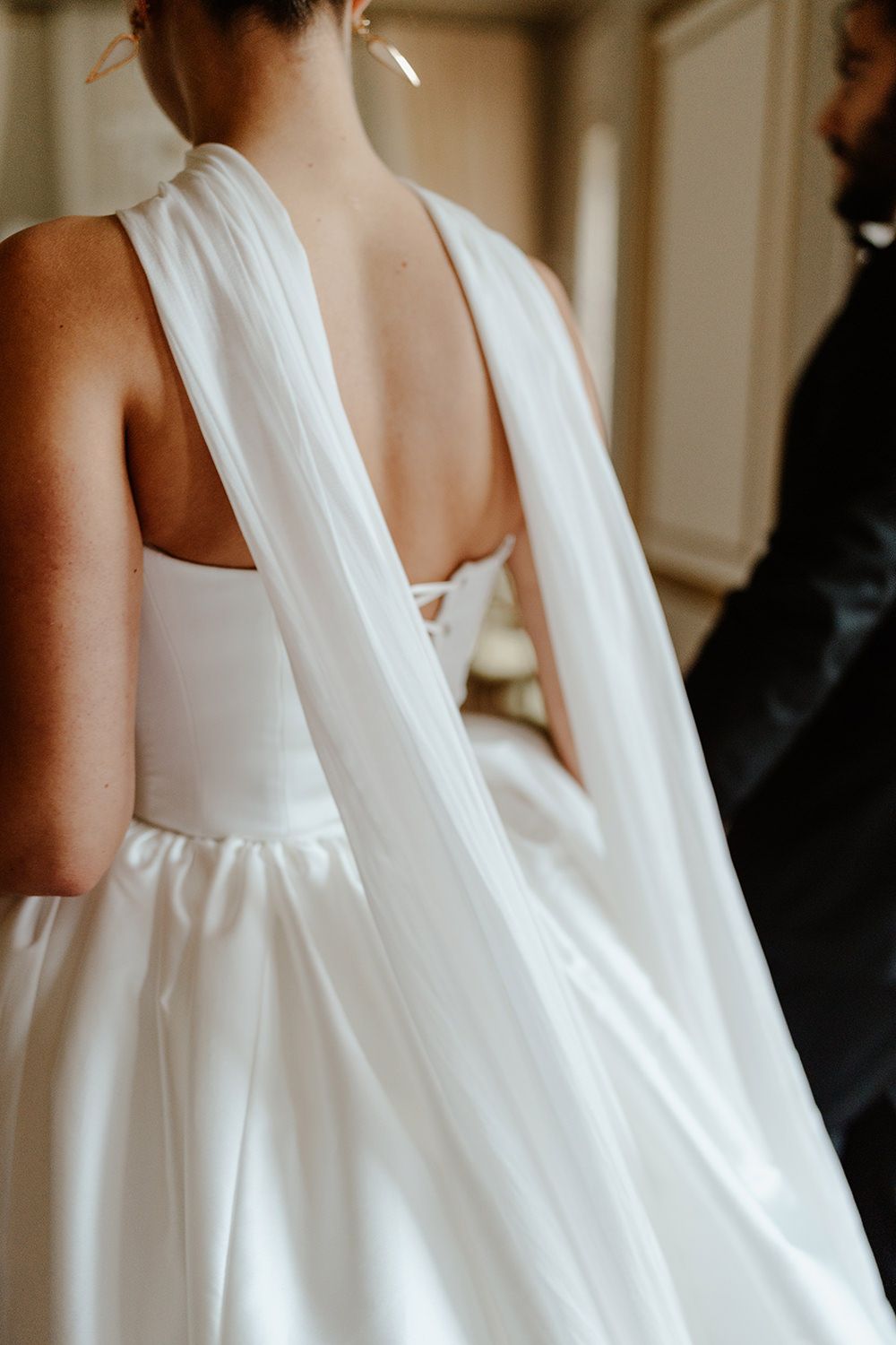 Editorial wedding photography detail of a brides dress.