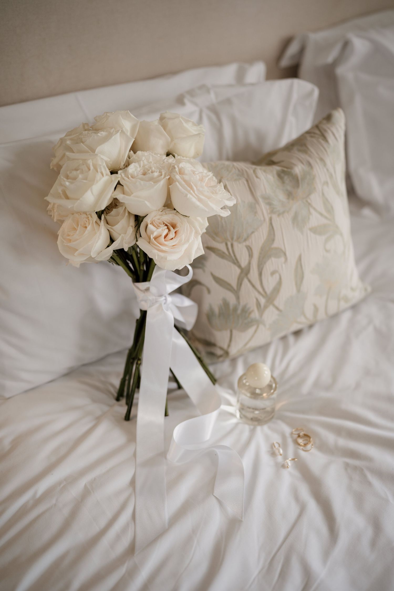 Long stem white wedding roses and perfume at Middleton Lodge Estate.