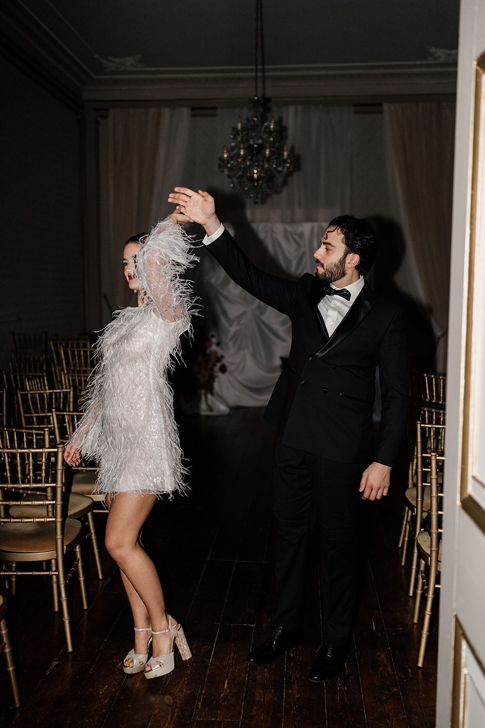 Bride and groom dancing on their wedding night, taken using flash photography.